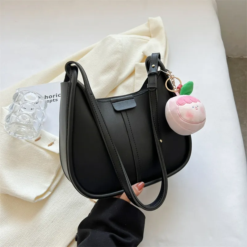 Túi xách mini đeo vai là gì?